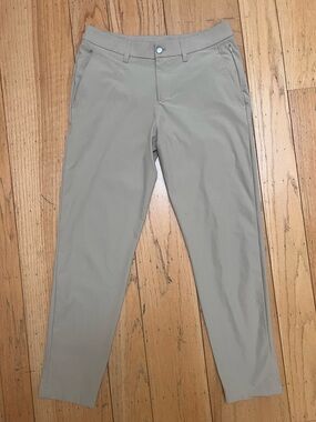 Men’s Lululemon ABC Pants in a versatile khaki/tan color.